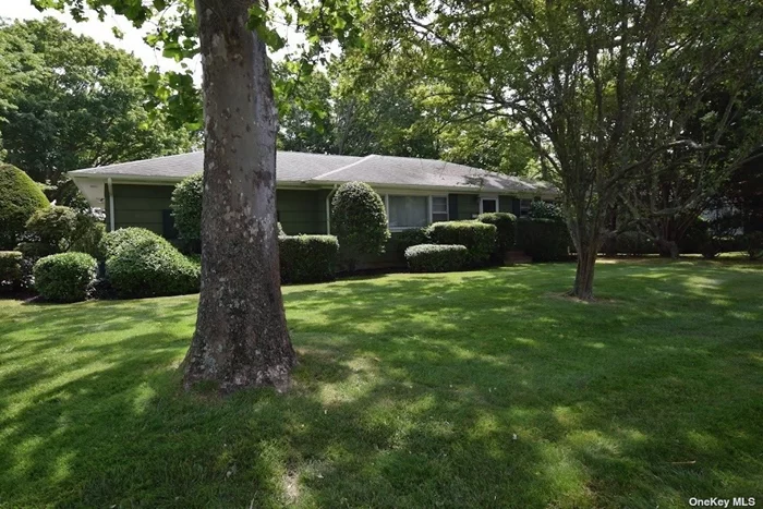 This ranch house is the perfect place to call home, whether it is for full time living or a weekend getaway. The spacious living room opens into the formal dining room, with sliders to the back entertaining deck. This room is currently being used as a family room. The large kitchen has stainless steel appliances, granite counter tops, and plenty of room for a dining table. Off of the kitchen is a powder room, perfect for use from guests in the yard. There are 3 bedrooms and a full bath, full unfinished basement, and a one car attached garage. Wood floors are as shown. A short distance to boutique shops, restaurants, Bellport Marina and Whalehouse Point Ferry to Ho-Hum beach/Fire Island. Close to Country Club 18 hole golf course/tennis facilities, Gateway Playhouse and much more.