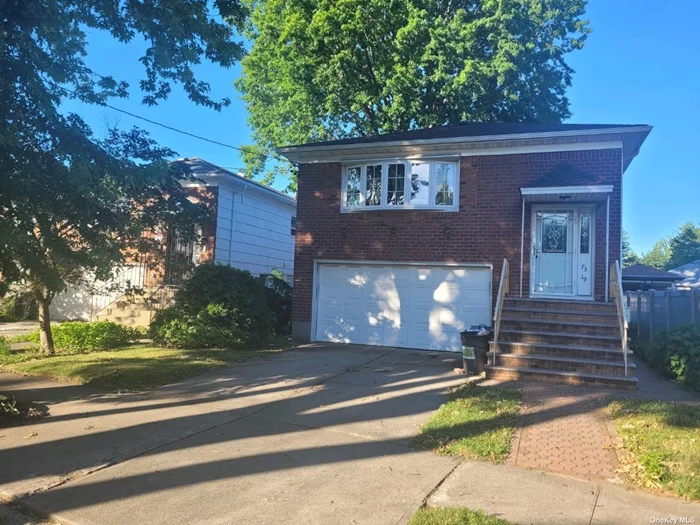 Lovely 4 bedroom raised ranch. Newer kitchen, roof, and windows. Open floor plan. Oak Flooring on main living level, 2 Car garage, rear sliders to patio, laundry room. House has solar panels.