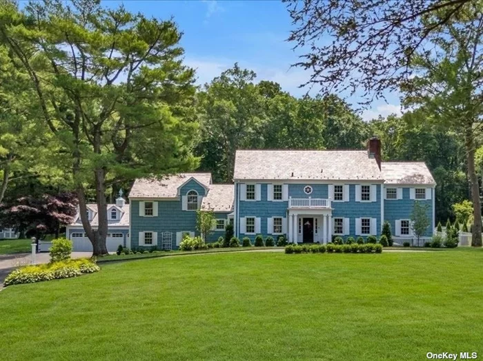 Situated on 2 acres of meticulously landscaped grounds, this exquisite center hall colonial offers privacy and serenity. The moment you approach the property, you&rsquo;ll be captivated by its timeless beauty and attention to detail. Built by Walter Uhl, a major builder of Long Island homes (Flower Hill Estates in Manhasset) every aspect of this home has been thoughtfully updated to blend classic charm with modern amenities. A spacious primary suite includes a sitting room, white marble bath and 3 walk in closets. An expansive guest wing provides plenty of room for visitors. Step inside and discover a world of elegance and comfort. From the entryway to the living areas, every room exudes warmth and sophistication. The outdoor spaces which include an inground pool, cabana, patio and grill area are equally impressive, perfect for relaxing or entertaining. Jericho School Disctrict