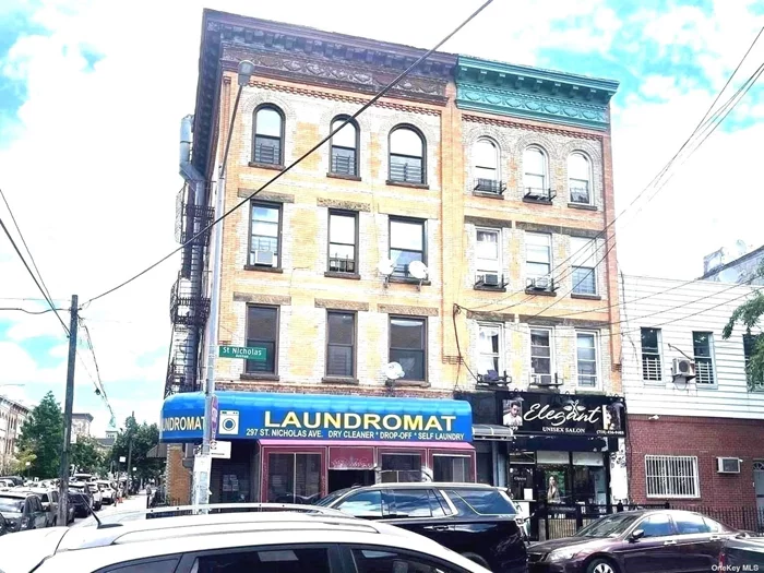 Mixed-Use Corner Building in Ridgewood  + Location: 297 St Nicholas Ave, Queens, NY 11385  + Property Type: Mixed-Use (7 Apartments + 2 Commercial Units + Basement) + Total Square Feet: 7, 260 + Investment Opportunity: Outstanding Free-Market Investment  Property Overview + 7 Apartments- Newly renovated, free-market 3 and 4-bedroom residential units. + + Apartment 1R- 4 Bedrooms, Living Room, EIK (Eat-In Kitchen), 1 Full Bath + + Other 6 Apartments (1F, 2F, 2R, 3F, 3R, 4F, 4R)- 3 Bedrooms, Living & Dining Room, EIK, 1 Full Bath + 2 Commercial Units - + + Laundromat (800 sq ft) + + Vacant store (150 sq ft) + + Basement- Additional space for storage or potential use  Prime Location + Situated on a corner lot at the Ridgewood/Bushwick border + Within 1 block of shopping, eateries, restaurant services, bus stops, and subway stations (L and M trains at Myrtle-Wyckoff Ave).  Investment Highlights  + CAP Rate- Currently at 6%, generating $241, 300 annually. + Projected Income- $416, 491 in five years for 10% CAP Rate. + Lease Details- Laundromat lease expires in 2027, with a 3% annual increase. Don&rsquo;t miss this amazing opportunity to invest in a highly sought-after neighborhood in New York City! Call for more information and to schedule a showing today!