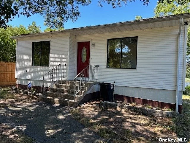 Move in ready! New Kitchen, New Bath, New Floors, New front door, fresh paint. Raised ranch on Beautiful 1/2 Acre of Waterfront Property. Additional Features Offered: Living Room, Primary bed, Central Air, Eat-in Kitchen, Huge Deck Overlooking Deep Wide Creek that Exits to Forge River Into the Moriches Bay and a Full Unfinished Walk-Out Basement. The photos tell the story!