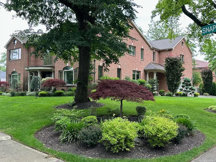 Welcome to this exquisite 2007 Brick Center Hall Colonial entertainer&rsquo;s delight in the acclaimed East Williston School District. This move-in ready corner residence spans 5200 sq. ft. above grade & approx 1800 sq. ft. finished below grade on a meticulously landscaped 0.37-acre lot. An inviting foyer and silk window treatments, coupled with the warmth of radiant heating, creates an atmosphere of sophistication and coziness throughout. The spacious layout includes six bedrooms and 5 ? bathrooms with the master suite including his/her closets and attached bathroom with hot tub and steam shower. Included is a whole house wired Sonos system and comprehensive wired alarm system as well as a front and back staircase. There are Pella windows and doors and LED lights throughout. The full finished basement features a state of the art 14 foot light up gemstone bar.  Step outside to a fully fenced private backyard oasis, perfect for outdoor gatherings and relaxation.  Experience the luxury and convenience of this remarkable home and make it your own., Additional information: Appearance:Excellent, Interior Features:Lr/Dr, Separate Hotwater Heater:yes