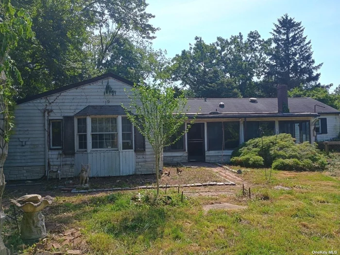 Unusual and interesting expanded ranch on a huge lot, on a great street, in a great neighborhood. Needs updating but has huge potential. Make it your own. Eat in Kitchen, living room, screened porch in rear, large family room and den. 2 Bedrooms. 2 full Baths. Two large sheds in rear.