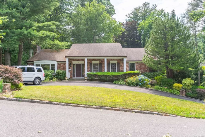 Stunning Ranch in East Hills, Roslyn! This spacious ranch features 5 bedrooms and 3.5 baths. It includes a generous living room and a formal dining room. The large eat-in kitchen is equipped with high-end appliances and granite countertops. The master suite offers an en-suite bath and a walk-in closet. Hardwood floors are throughout the home, and additional features include a theater room and a double car garage. A smart home system, alarm system, and Tesla charger are included. The property is zoned for Roslyn Schools, Harbor Hill Elementary, and comes with East Hills Park membership. Options for a one-year or two-year lease are available. Dogs under 30 Pounds. Renters insurance is required. The landlord pays for lawn maintenance.