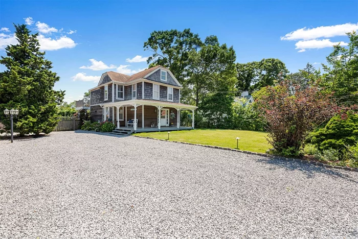 This light and bright renovated home is ready for its next occupants. The four bedroom, three bath traditional is being offered unfurnished as a year-round rental. Conveniently located close to the shops, markets, and restaurants of downtown Hampton Bays. Enter from the charming front porch into the foyer area that opens to a spacious living room and dining area that is perfect for entertaining. The welcoming kitchen offers top-of-the-line appliances and plenty of counter space and cabinet storage. Off the kitchen is a laundry room/ pantry and a full bath. A glass slider opens out on to the backyard that boasts a large covered porch, fire pit area, and shed. A putting green for golf enthusiasts awaits. The second floor of the home includes a primary bedroom with its own private deck overlooking the beautifully landscaped grounds. Two additional guest bedrooms and a newly renovated bath complete the upper level. The lower level was legally finished for additional living space and offers a family room, 4th bedroom, a full bath, and additional storage.