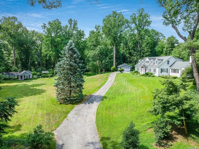 Welcome to your dream country house in the heart of Locust Valley! This newly renovated home nestled on 4.02 acres offers a picturesque property and 4 bedrooms and 3 full bathrooms. The main house is totally updated with modern amenities and great entertaining spaces. Sunlight filled living room, formal dining room and spacious Great Room w/wood burning fireplace, Cathedral ceilings and exquisite architectural details. The Chef&rsquo;s kitchen includes custom cabinetry, marble counter tops and premium appliances. There is a first-floor bedroom w/ensuite bathroom. The 2nd floor has a spacious Primary Bedroom with closet and ensuite bath. Two additional bedrooms and bathroom. Terrace perfect for outdoor dining and entertainment. Additionally, the property has a charming guest 1 bedroom/1 full bath cottage, a quiet sanctuary for guest or can serve as a peaceful retreat for yourself. This exceptional residence offers the perfect blend of privacy, elegance and convenience, making it a rare find.