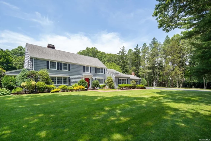 Discover elegance and comfort in this meticulously maintained Colonial home on a perfectly manicured 2.68-acre flat parcel in the Incorporated Village of Laurel Hollow. The bucolic and private outdoor sanctuary features an in-ground heated gunite pool adjoining a brick patio, ideal for relaxation and entertaining. Inside, enjoy spacious, sunlit principal rooms, with hardwood floors flowing throughout. Entertaining is easy with a large formal Dining Room, a light-filled Living Room and a generous, updated, eat-in Kitchen attached to a Great Room with Fireplace. Enjoy sweeping views of the stunning property from the cozy sunroom with French doors to a private patio. The Kitchen offers quartz countertops, double Wolf wall ovens, oversized GE Monogram refrigerator and easy access to rear grounds and patio. Upstairs, the oversized Primary Suite boasts a luxurious bath, and three additional sizable bedrooms and a full bath. The Lower Level is comprised of a Family Room with fireplace, a guest bedroom with en-suite bath and walk-out backyard access, plus a powder room. Amenities also include a whole-house generator, a 3-car detached garage and abundant storage space ensuring every practical need is met. This home seamlessly blends luxury and functionality, presenting a rare opportunity in Laurel Hollow. CSH SD#2 Laurel Hollow Beach (dues required)