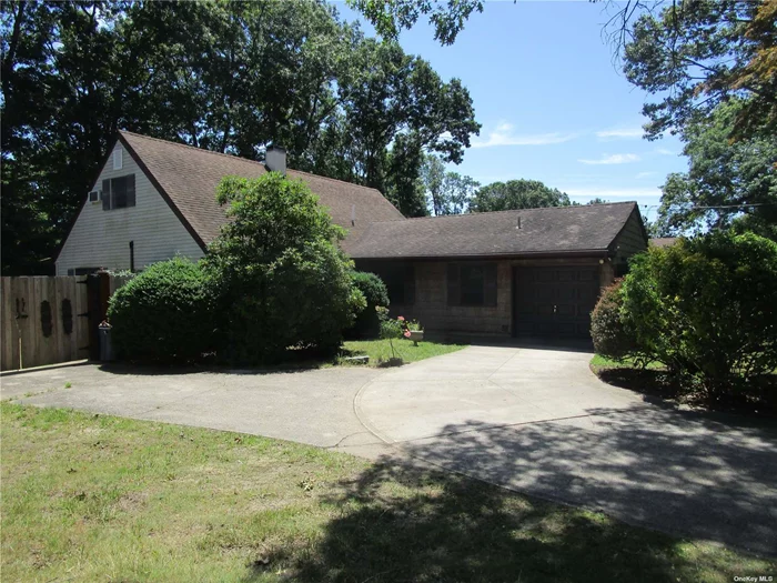 This elegant, spacious home was updated in 2018, new kitchen, new appliances, updated baths & Andersen windows, parklike property in beautiful wooded neighborhood, close to schools & parks!