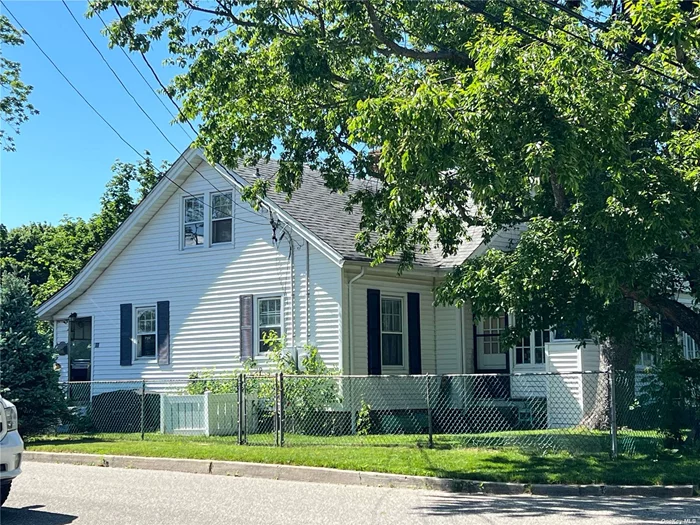 Kings Park Fixer upper. Three bedroom two bath home that has great potential. The home has wtwo gas meters, two boilers, two electrical meters. Gas and Oil in the house. Located in the kings park school district.