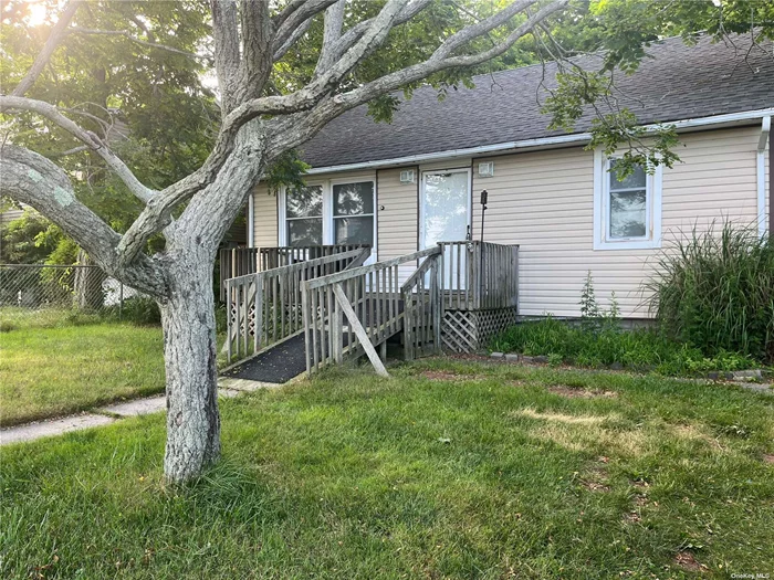 Nice looking home with two bedrooms, one bathroom, living room and kitchen all on the 1st floor. There is a partially finished attic with heat which can be turned into another bedroom or left for storage. There is a beautiful big back yard with two large sheds on the property. Five minute walk to the beach and Osprey Park. The stove is gas while the heating and how water are oil. The boiler is a great shape and the septic was replaced last year and we have paperwork for the work. House has lot of potential.