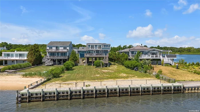 Sea breezes, jaw dropping views of the scintillating Great South Bay, the sounds of marine birds, everchanging boat activity - these are the simple pleasures that you&rsquo;ll have the opportunity to revel in at this picturesque waterfront cape set within the Osprey Cove community. Perhaps one of the best value, most attainable waterfront opportunities on the south shore of Long Island at this juncture in time, this residence could make for an ideal weekend getaway spot or for year-round living! Set on just shy of a quarter acre of level, totally cleared land at the mouth of the Forge River, and offering approximately 150&rsquo; of direct open bay frontage with recently replaced bulkheading and docking. Within minutes, you have the ability to cross your backyard, hop into your boat, and reach the open Atlantic Ocean by means of the Moriches Inlet - or take a leisurely paddle along the shoreline or up the Forge River, OR venture a bit further and navigate east toward the Hamptons, or west to Fire Island. This location is a true water enthusiast&rsquo;s paradise. With many recent upgrades, including a first floor that was taken down to the studs, the home itself is move-in ready. Upon entering, two oversized picture windows in the primary living area perfectly frame the bay views while vaulted ceilings, wood beamn detail, and skylights add to the airiness of the space. Indoor/outdoor living, with access off the main level to a huge raised deck, newly constructed in 2022. At the front of the house, just off a fully updated kitchen (new cabinetry, Corian counters & butcher block island, new appliances, full subway tiled backsplash, and beautiful wood detailed ceiling), a second vaulted area serves as a spot for formal or informal dining - and offers more views of Lons Creek & the Forge River to the west & north, through a great bay-style window. Again, VIEWS from everywhere! Two bedrooms and a fully updated (3 years ago) full bathroom complete the main level. A full floor primary suite is featured on the second level offering wild views, a full bathroom, generous closet space, convenient in room laundry, and direct dual Andersen slider access to a rooftop deck and jacuzzi room/sunroom accessible only to the primary. Many other upgrades are to be considered - among them, a significant lift of the entire house - no flooding concerns, a 2 year old conversion to a high end natural gas Navien heating system & Rheem HW heater, exterior siding updated 1 year ago, a 5 year young roof, and new cesspool installed in approximately 2012. 55 Oceanview is set on supremely quiet dead end block, with access at the opposing side of the block to Osprey Park, for Town of Brookhaven resident use. By car, one will be close to ocean beaches, shopping, and the East End of Long Island - from the awesome towns & villages of the Hamptons to the vineyards of the North Fork. True taxes, before STAR, total to $11, 707. A must see opportunity.