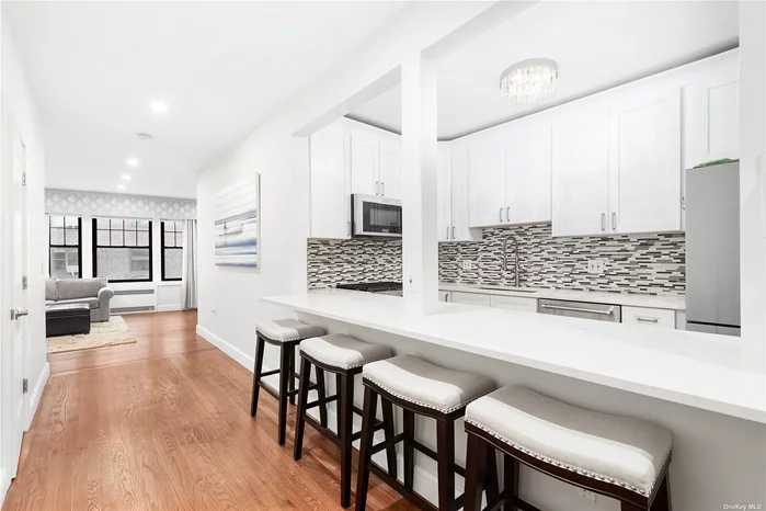 Beautifully renovated apartment in the heart of Forest Hills. Features a large custom chefs kitchen with countertop seating. Full renovated bathroom. King size bedroom.