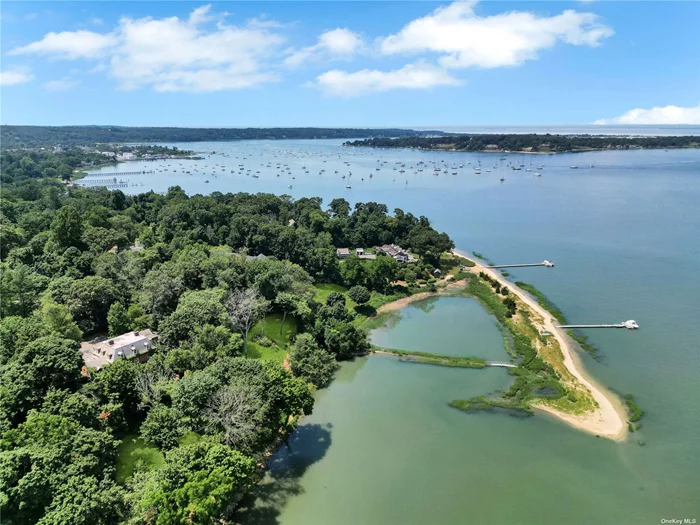 One of the last manageable waterfront estate homes designed by the noted architect Bradley Delahanty. Modeled after classic English Georgians and the homes of Tidewater Virginia. A peaceful oasis, Greenbridge retains all of its original moldings, fireplaces, gardens, stone terraces. First floor bedroom suite and private beach. The property includes a pool and late 1800s brick pool house at the waters edge with picturesque views of Oyster Bay, Centre Island, and seabirds.