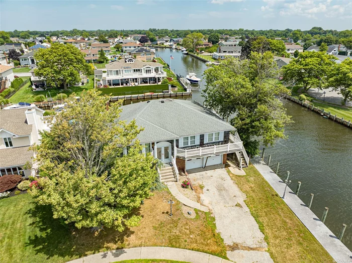 Unique Waterfront Opportunity in West Islip! Nestled along one of Captree&rsquo;s majestic Grand Canals, this spacious expanded high ranch presents breathtaking bay views and boasts 300 feet of bulkheading. Perfect for water enthusiasts, the deep water canal accommodates multiple boats with ease. This versatile home offers potential as a mother-daughter setup (subject to permits) and sits on a corner lot featuring an in-ground pool and a convenient two-car garage. Experience serene sunrises and mesmerizing sunsets right from your own backyard! Don&rsquo;t miss out on making this waterfront gem your own.