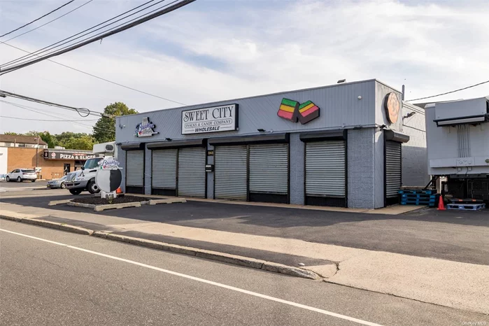 Fantastic opportunity to own a free standing mixed use building in the heart of Farmingdale. High visibility corner location features 10, 500 sq. ft lot, an additional 640 sq. ft. garage like structure with electric for extra storage. Updates include new walk up window. Split heating/AC units. LED lighting throughout. Updated 400 amp electric, 2 updated half baths, 3 offices. Storefront on Main St. Loading dock on Frank Ave., Space can be easily converted to two separate businesses. Security system with 21 cameras included. 20 private parking spaces. Close to all major parkways. Location! Location! Location!