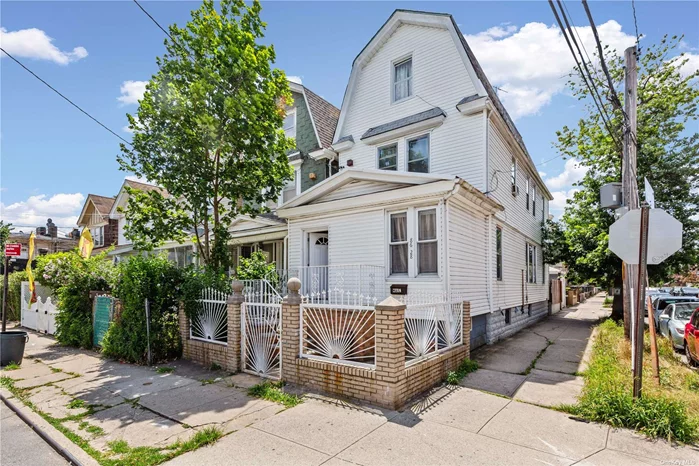 Great opportunity to own a 5 bed, 4 full, bathroom corner house with private garage for parking in the heart of Woodhaven! A block from the train and major shopping , this 3 level home with full basement offers great space and prime location.