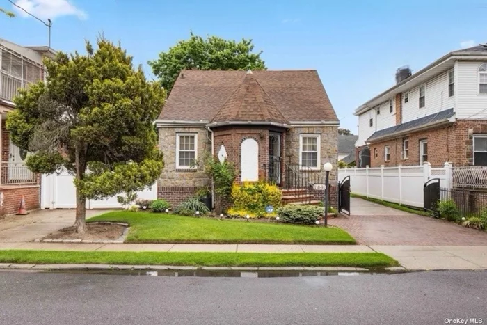 This charming, brick and stone facade, cape home has been lovinlgy maintained. Upon entering you will find yourself in a grand living room with high ceilings and a decorative fireplace. The recently updated, eat in kitchen, boasts magnificent finishes such as granite counter-tops and stainless steel appliances. The first floor also includes a bedroom, dining room (which may also serve as an additional bedroom) and a full, elegant, bathroom. The second floor ensures your privacy with a seperate and spacious bedroom. Below the first floor you will discover a fully-finished basement with its own entrance. The property also includes a secluded backyard with a patio and a one car garage. A private driveway ensures your commute will always end easily as space for your vehicles will be assured.