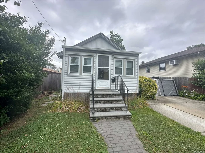 Come See one of the most affordable Homes in Nassau County, featuring many updates-siding, windows, arch roof, finished basement! Gas Heat and Cooking, Driveway, Yard, Close to All, Low Taxes in the 6&rsquo;s without STAR. So much potential to Expand and Dormer and Make into a Renovated Colonial-Owner Financing Option! Won&rsquo;t Last!