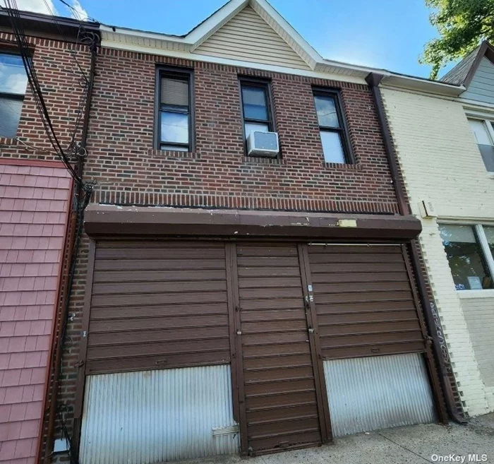 Store front commercial office space with half bathroom.