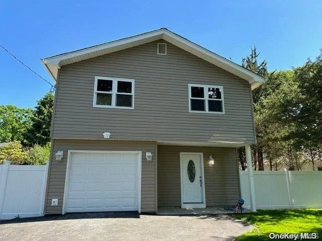 Newly Renovated 4/6 Bedroom Hi Ranch. New Custom Kitchen With Stainless Steel Appliances & Granite Countertops, 2 New full Bathrooms with marble. Hardwood floors upstairs. Wood look tile on ground floor. New Roof, siding, windows, driveway, concrete patio. Tons of upgrades. Looks better then new construction.