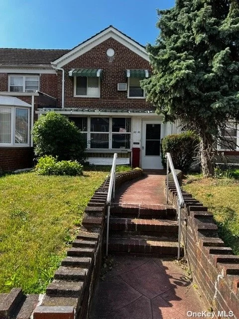 An attached 3 BR Colonial 18ft Hardwood Floors plus Gas Cooking, Finished Basement, Private Driveway, Roof 3 years old, New Flooring in kitchen, New windows land on 1st Floor, Cedar closet, AC Units, Close to Homes of worship, Shopping, Close to homes of worship and shopping.