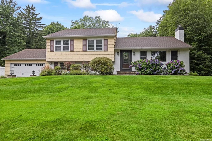 Located in the highly desirable Salem Ridge Neighborhood and within Harborfields School District, this delightful and well-maintained split-level home is ready for you to make memories. The versatile floorplan offers a classic design that maximizes space and light allowing for seamless flow fit for any lifestyle. The welcoming foyer opens to the sun-lit living room with big windows, a beautiful wood-burning fireplace, and custom floor-to-ceiling built-in. The formal dining room is ideal for hosting gatherings with friends and family. Stainless steel appliances, wood cabinetry and a generous skylight illuminate the eat in kitchen. Wood Floors and classic moldings are found throughout. Upstairs you&rsquo;ll find the bedrooms including a lovely Primary suite with two ample closets and a private bath. Two additional bedrooms and another full bath complete the second level, offering comfort and privacy for all. Relax in the more casual living space that is steps down from the main living area which offers additional living or can even be used a sunny office overlooking the peaceful backyard through French Doors. Useful amenities like a convenient laundry area, spacious mudroom with a large pantry, and direct garage access add to the home&rsquo;s appeal. Situated on a sprawling 1-acre lot, the flat and usable yard has endless possibilities-think poolside fun, sports games, or lush gardens to enjoy year-round. Near schools, beaches, parks, LIRR and vibrant Huntington Village, Northport Village, Centerport and Greenlawn. This One You Do Not Want To Miss!!!!