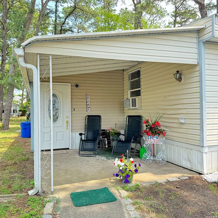 Step into refined comfort and community in this newly renovated 2-bedroom, 1-bathroom mobile home nestled in Riverwoods, an active 55+ community. Freshly updated in 2024, this residence radiates modern appeal and practicality. The enclosed porch at the entrance can serve as a versatile third bedroom or an office area, catering to your lifestyle needs. The home features central AC and forced-air heating for year-round comfort. A newly revamped laundry area with a washer and dryer adds convenience. Enjoy the propane gas stove in the kitchen for culinary delights. Outside, a private driveway, and a useful shed for storage. Monthly maintenance fees of $900 cover land use, water, sewer services, and include access to the community gym and clubhouse-an inviting space for social gatherings and activities. Don&rsquo;t miss out on this exceptional opportunity! The rent includes taxes, water, snow, and trash removal, along with cesspool maintenance. All applicants must pass credit, financial, and background checks conducted by management to maintain a secure community environment.