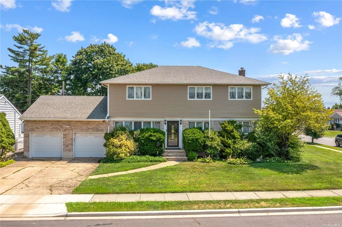 Welcome to the highly sought-after Syosset School District! This stunning turnkey Colonial home, with a fully gut-renovated interior using high-quality materials, boasts a modern look with engineered wood floors throughout. Situated on a spacious 7, 360 square foot corner lot, this home features 5 generously sized bedrooms and 3 full baths. As you step inside, you&rsquo;ll be immediately impressed by the beautifully updated flooring and the abundance of natural light that floods the living areas. The first floor includes a spacious living room, a family room, and a bedroom with an en-suite bathroom. The updated eat-in kitchen is a chef&rsquo;s delight, featuring custom cabinetry, energy-efficient appliances, and a sliding door that provides easy access to the backyard, perfect for outdoor entertainment and relaxation. Upstairs, you&rsquo;ll find the master suite with a full custom bath and a walk-in closet, along with 3 additional bedrooms and 1 full bath. The upgraded bathrooms feature smart toilets, adding a touch of modern convenience. The full basement provides extra space and a storage area. Other highlights of this magnificent home include recently updated within the last few years central air conditioning and boiler, roofing and siding, a 2-car garage, and an attic above the garage that can be used as an extra storage room. The property is conveniently located near shopping and schools, convenience to all.