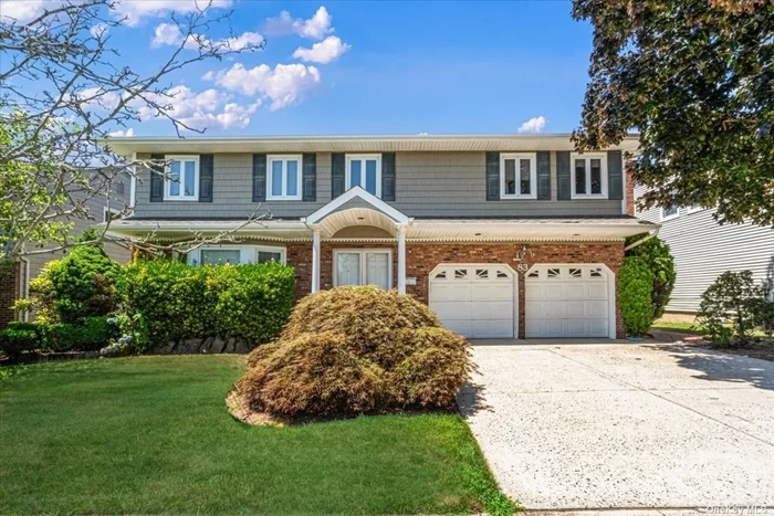 Welcome home to this charming 5 bedroom 3.5 bath Colonial home in Acorn Estates of East Rockaway . Upon entering this beautiful home you are greeted by a spacious foyer flanked by a formal living room on one side with hardwood floors, towards the back of the home you have a large family room with vaulted ceilings and a skylight with fireplace, the formal dining is next to the kitchen making it easy to maneuver when you are entertaining. a half bath is conveniently located on the main floor for guest. Upstairs the primary bedroom is of a generous size with a primary bathroom the other 3 bedrooms are of a good size with closets and share a full bath. the home comes with central air 2 zones, The finished basement is perfect for recreation or additional living space. The home comes with a 2 car garage for ample storage and parking, this charming home is close to the parkways and schools.