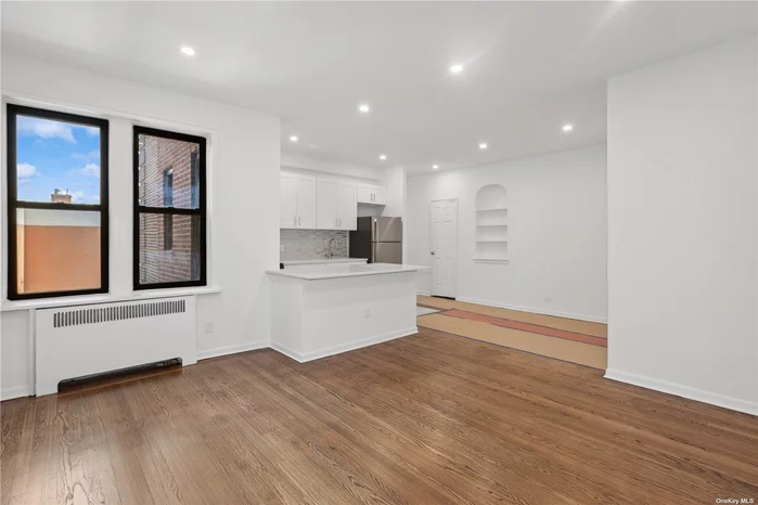 Astoria Gem! All new gut renovated one bedroom. Features include custom designed open kitchen layout with island. Stainless steel appliances including dishwasher and microwave. Stunning hardwood floors, sleek windowed bath, gracious foyer and fabulous closets.