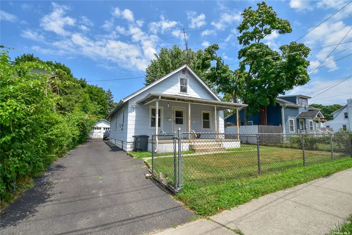 What an opportunity to purchase a true PJS Charmer! With wonderfully low taxes at just $5, 339, this home is not only charming but also affordable. Featuring a large front rocking chair porch, this classic 1930&rsquo;s style ranch offers hardwood floors under all carpets. The roof, approximately 20 years old, is in great shape and consists of a single layer. Located in a quaint area with sidewalk-lined streets and a fire hydrant in front of the home, this property boasts a large 2-car detached garage in the back, a partial basement, and a spacious attic for ample storage. While this home does need updates, it is completely livable and makes for a great starter, retirement, or investment property. Don&rsquo;t miss out on this fantastic opportunity!