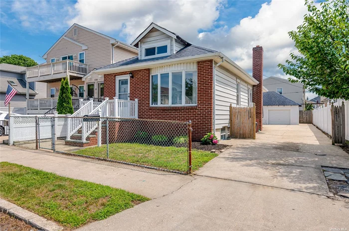 Come View this Legal 2 Family Classic Brick Bungalow Perfectly Situated in the Heart of the Eastholme Section of Long Beach. As you enter the main floor unit you are greeted by a foyer and sunroom, spacious living room, formal dining area off the eat-in-kitchen with access to the backyard, full bath and two small bedrooms. The lower unit features a spacious living room, an over-sized bedroom, full bath and a customizable kitchen space, complete with essential hook-ups, allowing you to design and install your preferred cabinets and appliances. Additional features: original wood flooring, washer/dryer, french drain system, roof approximately 7-8 years old, entire interior freshly painted, backyard for entertaining, 2 car detached garage with a driveway providing a plethora of parking. Minutes to all... Long Beach&rsquo;s Famous Boardwalk, Pristine Beaches, Reynold&rsquo;s Channel, Local Shops, Restaurants, LIRR and Parkways. Come Live at the Beach!