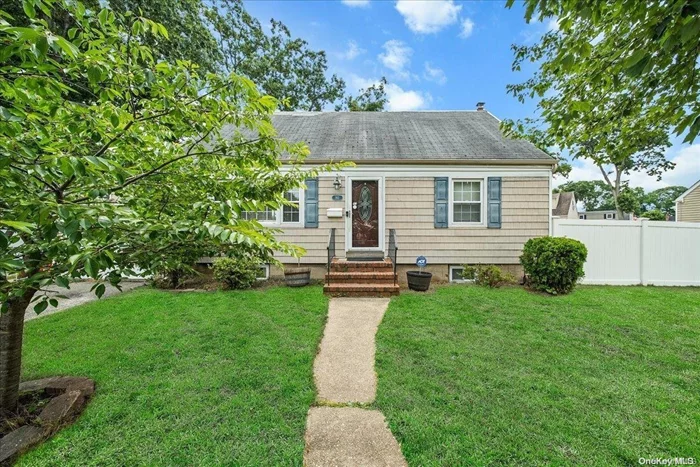 Welcome to 165 Cartwright Blvd. This delightful Cape Cod-style residence in the Massapequa school district within the Village of Massapequa Park. Highlighting wood floors on the main level, the home boasts two bedrooms downstairs and two more on the second floor. Additional amenities include a full basement and an attached one-car garage. Situated near Massapequa High School and a plethora of excellent dining options, this property presents a fantastic opportunity!