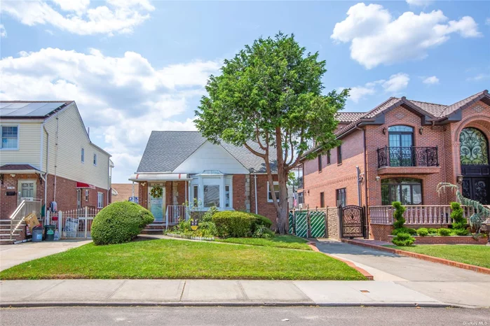 A True Charmer! Brick Cape Zoned To Dis 26 Schools Features 3 Large Bedrooms, 2 Full Baths, Eat-in Kitchen, Living Room, & Dining Area With Ample Storage. Very Spacious Basement W/ Separate Entrance & Great Potential. Gas Cooking & Oil Heating. Private Driveway. Mid-Block On Quiet Tree-Lined Street. One Of The Best Locations In Fresh Meadows On A Flat 4000sqft Lot! Convenient To All!