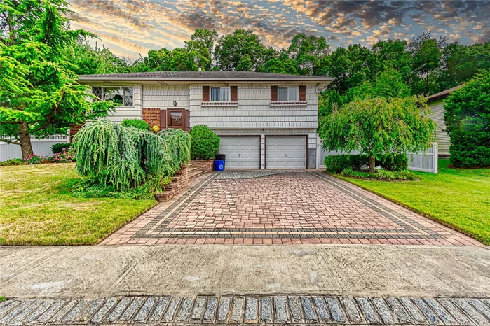 Welcome Home To This Lovely Hi Ranch With Lots Of Updates Including The Heating System, Hot Water Heater, Cesspool, Central Air System, Roof, Fencing, Kitchen Appliances, All The Big Ticket Items Taking Care Of Just Ready For Your Boxes!!! Hardwood Floors Throughout Upstairs Has A Expansive Living Room, Formal Dining Room, Updated Eat-In-Kitchen With Granite Countertops, Full Bathroom, Primary Suite And 2 Additional Bedrooms, Downstairs Has An Incredible Family Room, 4th Bedroom, Half Bathroom, Laundry Area, 2 Car Garage, Gas Is In The House For Cooking And Dryer, The Backyard Is Fully Fenced And Very Private Perfect For Family Gatherings, Steps From The Park, Close to Shopping, Beaches, And Public Transportation!! This Is An Amazing Home !!  Dont Miss Out:-):-)