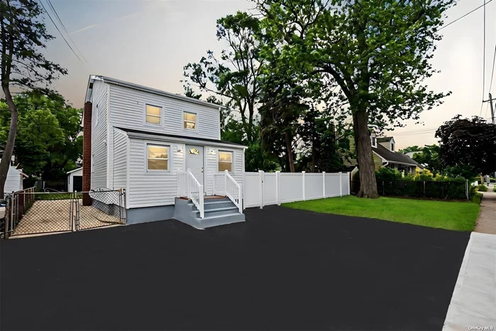 Welcome to this fully updated classic Colonial in a serene Bellmore neighborhood. The open-concept design connects the living and dining rooms, creating an inviting atmosphere filled with natural light from large windows. The Modern kitchen features granite countertops, stainless steel appliances, ample cabinet space, and a center island for prep and casual dining. It flows seamlessly into a cozy family room, perfect for gatherings or quiet evenings. This home boasts 4 spacious bedrooms and two modern bathrooms. Brand New Sidings & Roofing. The full unfinished basement with Bilco doors provides customization potential. Additional features include a private driveway, ample parking, and a detached two-car garage. Combining modern elegance with practical functionality, this home provides a comfortable and stylish living space for everyone. Welcome home!