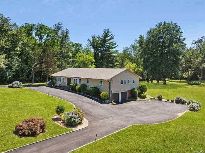 Discover this stunning 4-bedroom, 2.5-bath ranch situated on 2 parklike acres at 19 Berry Hill Road, Oyster Bay. This lovely home boasts a spacious eat-in kitchen, formal dining room, formal living room, and a large family room with a fireplace. Additional features include a full basement, 2-car garage, circular driveway, and a new roof in 2023. The all-flat, usable property is adorned with mature plantings and trees for ultimate privacy. The AC condensers were replaced in 2019. Located within the sought-after Oyster Bay school district, this property is just minutes away from beautiful beaches and boating. The house is virtually staged to show its potential. Don&rsquo;t miss out on this gem!