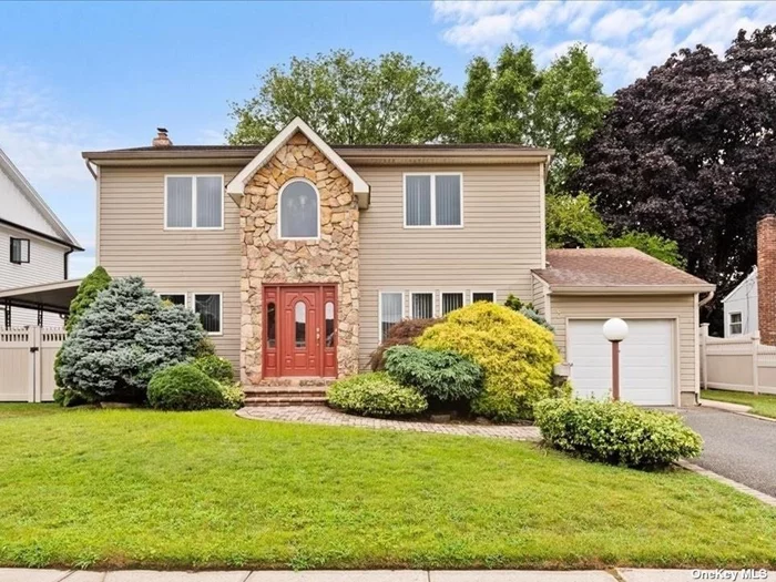 Luxury Surrounds You as you Enter the Dramatic Two Story Entry to this Custom Built and Extended Center Hall Colonial that Features all Large Rooms with Open Floor Plan and Gleaming Hardwood Floors. This Home also Boasts 3 Updated Baths and Mudroom Entrance to the Side Yard. This Mudroom Space Adjacent to Back Wall of Attached Garage can be opened to grant Garage access if Desired. This Gem is Located in the Heart of Plainview and Features King Size Plus Primary Bedroom with Walk-in Closet and En suite Bath Plus Three Additional Bedrooms and Full Finished Basement. Private Yard for Entertaining All Situated on a Quiet Mid Block Location that&rsquo;s Convenient to Shopping, Schools and Major Highways.