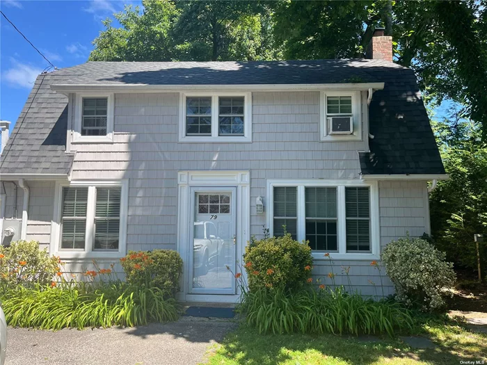 Charming 2 bedroom, 1.5 Bath Cottage in Port Washington Heights. Hardwood Floors Throughout. Eat-In Kitchen. 1-car attached garage. Washer/Dryer. Close to town and train.