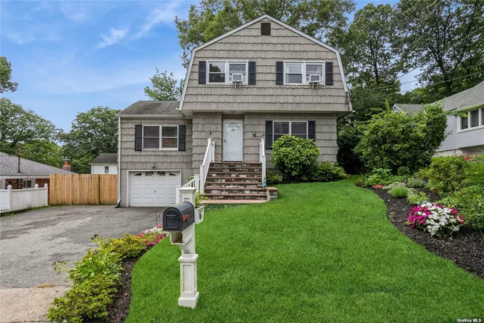 Move right in! This lovely, well-maintained (and freshly painted) home on a quiet dead end street is beautiful inside and out! You will find a sun-filled living room on the first floor as well as a charming family room with fireplace and the convenience of an adjacent full bath. There is also an updated eat-in kitchen with granite countertops, a laundry nook and a cozy dining room. 4 cheerful bedrooms and 2 additional updated baths (one in the primary bedroom) are on the second floor. The large basement with high ceilings provides a tremendous amount of storage as does the roomy garage. The wide driveway provides plenty of private parking. The beautifully landscaped yard (with in-ground sprinklers) is fully fenced and perfect for entertaining.