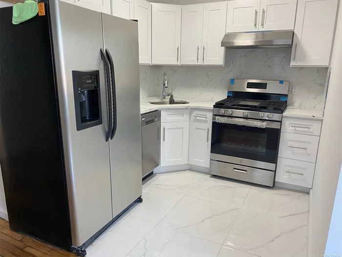 Newly Renovated Large 3 Bedrooms and 2 Full Baths on Second Floor in Heart of Bayside. Large Living Room, Dining Room, Updated Eat-In-Kitchen with Granit Counter-Top and Stainless Steel Appliances. Update Bathrooms, Heat and Water included. Hardwood Floor. Close to Public Transportation, Shopping, and Major Highway. Walking to Lirr. School District #26 (Ps 31 & Is 25). Close to Northern Blvd. A Must See.