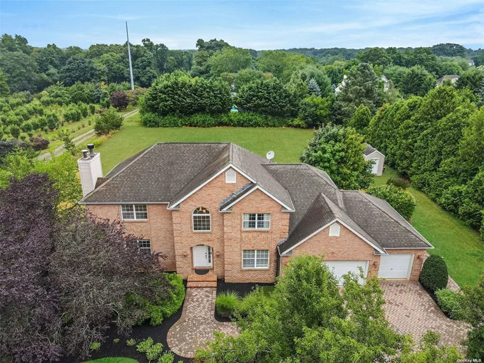 Welcome to your stately 4-bed, 2.5-bath home, with 3-car attached garage nestled next to a charming tree farm. An interlocking brick driveway and walkway enhance the property&rsquo;s aesthetic and lead to a large landscaped lot surrounded by mature trees for ultimate privacy. The lower level walkout provides convenient access to the yard, while the covered back patio offers a serene spot for your morning coffee. Inside, the chef&rsquo;s dream kitchen boasts granite countertops, an undermount sink, and intricate millwork opening to the dining area-perfect for entertaining without missing a moment of the conversation. A cozy fireplace on the main level adds warmth and ambiance, while numerous windows bathe the home in natural light. The spacious bedrooms include a primary suite with tray ceiling, large walk-in closet and spa-like ensuite complete with glass shower and jetted soaker tub. Imagine your life unfolding in this elegant home - where every detail is designed for comfort and enjoyment.