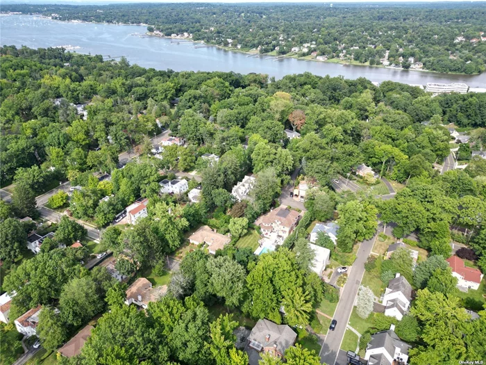 Totally Renovated Classic Colonial on lush 14, 200 sqft lot size in Prestigious Village Of Great Neck. This BEAUTIFUL HOME With Hardwood Flooring Throughout Includes Formal Living Room with Wood Burning Fireplace, Formal Dining Room & A Family Room With Skylight & Sliding Doors Out To A Brick Patio. The Beautiful all renovated Eat-In-Kitchen wih top Appliances & Granite Counter tops. Master Bedroom Features master bath & Large Balcony. 3 add family bedrooms with 2 baths. Third Floor Has Ample Space & Full Bathroom. NEW ROOF, NEW PLUMBING, NEW ELECTRICAL, NEW HEAT & COOLING SYSTEM, NEW APPLIANCES & MUCH MORE. Walk to park & worship! A MUST SEE!!!!!