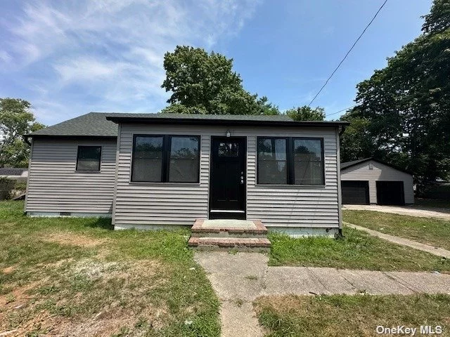 This beautifully renovated, oversized ranch features two bedrooms and two bathrooms, offering modern luxury and comfort. The home boasts luxury vinyl flooring and high-hat lighting. The updated kitchen is a chef&rsquo;s dream with quartz countertops, stainless steel appliances, and white shaker cabinets. Recent updates include new windows, a new roof, and new siding, ensuring the home is move-in ready. Additionally, the property includes an unfinished partial basement with an outside entrance and a very large detached two-car garage, perfect for car enthusiasts and those in related fields needing ample garage space. The large yard adds to the appeal, making this home an ideal choice for anyone seeking style and functionality.