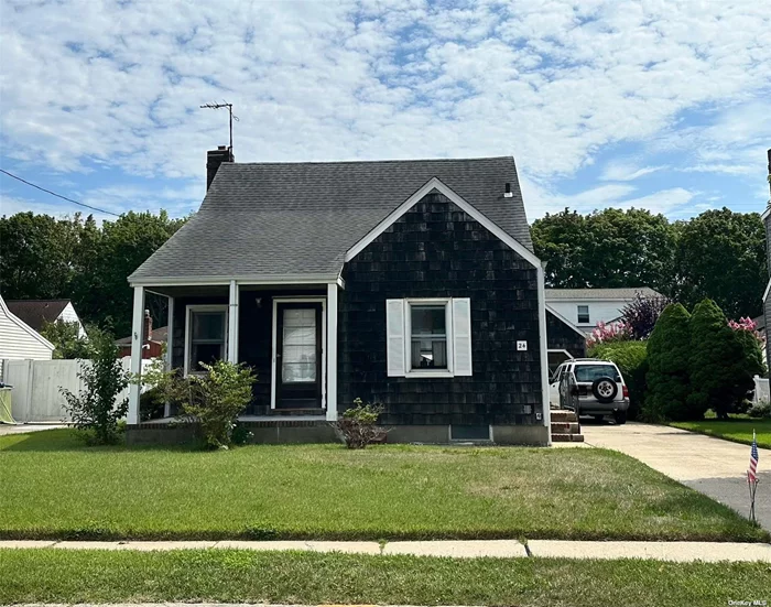 Here&rsquo;s YOUR Opportunity to OWN in the Award Winning Bethpage School District #21! Come and put your personal touches on this 4 Bedroom, 1.5 Bathroom Charming Cape with a Covered Front Porch in a mid-block location! 1.5 Detached Garage. Low Taxes! Close to All!