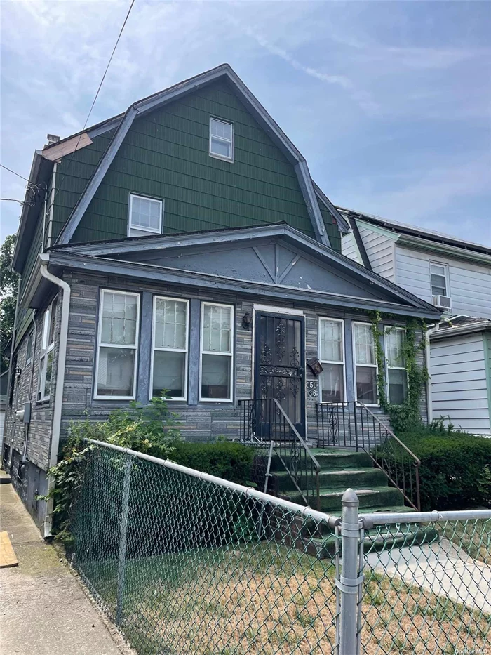 Welcome to this unique opportunity in the heart of Jamaica, NY! This spacious one family home that was converted to a legal two family is within a short distance to public transportation, making your daily commute a breeze. Minutes away to the Jamaica Long Island railroad and bustling downtown Jamaica avenue, which features shopping, dinning, and entertainment. This property features 3 bedrooms, walk up attic and 2 full bathrooms. With a little TLC, your vision and creativity this residence can truly shine like new! Highlights also include original hardwood floors that add charm and character, a cozy den area, full size basement with outside entrance and driveway with two car garage. Don&rsquo;t miss out on this fantastic opportunity to make this house your dream home.