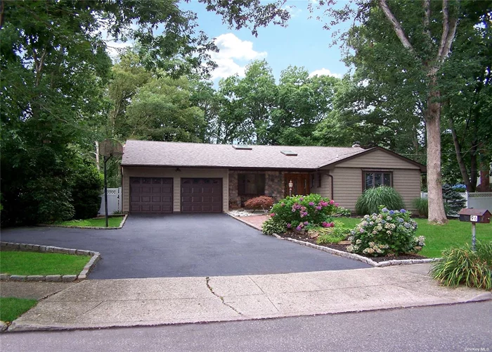 Located In The Heart Of Nesconset & Smithtown School District, This Spacious Ranch Has Much To Offer The Extended Family! Just Shy 2000SqFt. Entrance Hall W/Vaulted Ceiling, Skylight, Tile Flooring, & Beautiful Front Door W/Sidelites. Spacious Formal Living Rm W/HW Flooring Under Carpet & Multiple Casement Windows. Large Formal Dining Rm W/HW Flooring & Casement Windows - Great For Entertaining Guests. Large EIK W/Tile Flooring, Skylight, Hi-Hats, & Separate Dining Area. Family Rm W/Wood Beamed Vaulted Ceiling, Lovely Fieldstone Fireplace, Tile Flooring, & Slider Leading To Yard. Primary Bedrm Ensuite Includes 2 Double Closets. Recently Updated Full Bath In The Primary Bedrm W/Walk-In Shower, Grey Subway Tile, & Ceramic Tile. 2 Addit&rsquo;l Bedrms W/Ample Closet Space. Full Main Bath W/Tile. Laundry Rm W/Cabinetry & Storage/Pantry Closet. Full Finished Basement W/TV Room, 2 Rooms W/Closets (Could Be Office Or Gym), Snack Area, Full Bath, Large Walk-In Cedar Closet, Storage, & Utilities. Other Features Include: Pella Windows, Central Air, Peerless Burner, 200Amp Electric, 2Yr Old Roof, & 9Yr Old Siding. Large, Beautiful Yard W/Planters For Gardens, Trex Deck, Paver Patio, Shed, & IG Sprinklers. Charming Paver Stoop & Front Walkway. Double Wide Driveway W/Additional Side Parking All Lined W/Belgium Block. Colorful Plants & Foliage Adorn The Property.