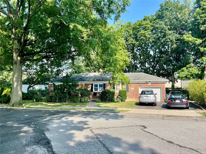 Welcome To This Sprawling Wide line Custom brick Ranch In Floral Park on quiet tree lined street! Prime Location With Close Proximity to Schools and Transportation. Just Minutes Walking Distance To LIRR - Floral Park Station. Close To Jericho Turnpike and Shopping Area. First Level includes Entrance Hall, Hardwood floors throughout,  3 Bedrooms w/ 2 Baths, Livingroom, Dining room, EIK. Lower Level includes 2 bedrooms, 2 Baths, FR, Kit, Walk out entrance. 1 car gar. Can be Mother/Daughter with proper permits. IGS, too much to list. House is Being Sold As Is. Make this home your own. Simply a must see!