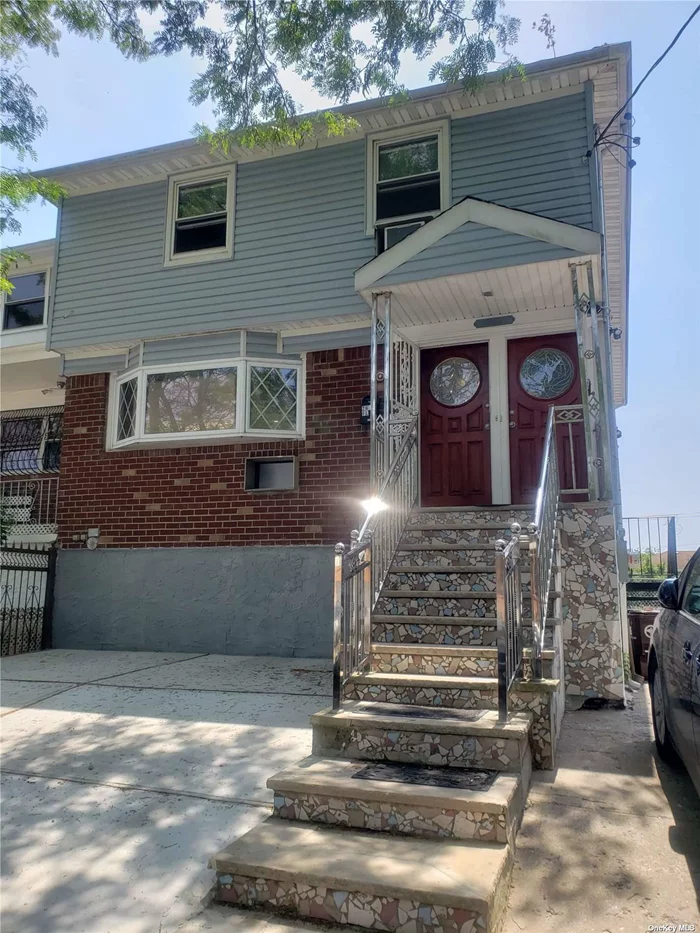 Great Investment Property on the waterfront in the heart of Rosedale, Queens. A huge semi-det 2-family house with a full, finished walk out Basement. Features 3Brs, 2baths (Master BR ensuite), huge LR, Formal dining area, Kitchen with Backsplash and rear balcony EACH on the 2 upper levels, plus a lower level with 2 extra units. Hardwood floor finish, Porcelain tiles wall & floor finish in the baths. Granite counter-tops, Stainless-steel Appliances, lots of closet spaces, etc. House gut-renovated in 2022. Quiet neighborhood, close proximity to Green Acres Mall, LIRR, Parks, Bus, etc. (N.B: Pics taken prior to current tenancies).