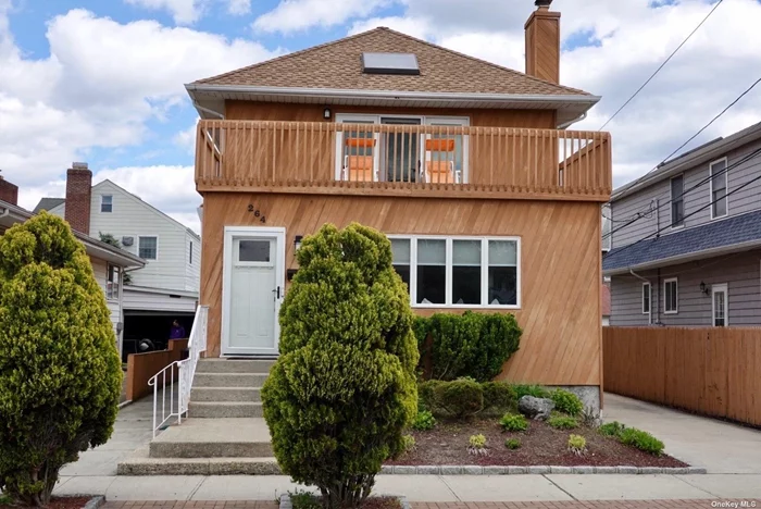 Beautiful 4 Bed/2 Bath Beachside Home in desirable Westholme Area of Long Beach three blocks to the Ocean. The 1st floor provides an open layout and modern upgrades to includes hardwood floors, a Fully Updated Kitchen w/ stainless Steel Appliances, Formal Dining, Bright & Spacious Living Room, 1st Floor Bedroom/Office, and a Full Bath w/ Luxurious Steam Shower. The Second Floor includes 3 spacious bedrooms (2 with private balconies and sunset views), a Full Bathroom, and walkthrough closet/nook. Partially finished basement with laundry room and plenty of storage. Outside includes a Private Driveway for 3 cars and a fenced in backyard with fire pit for entertaining. Close to Beach, Restaurants, Shops, Schools, and LIRR! Great Location!!